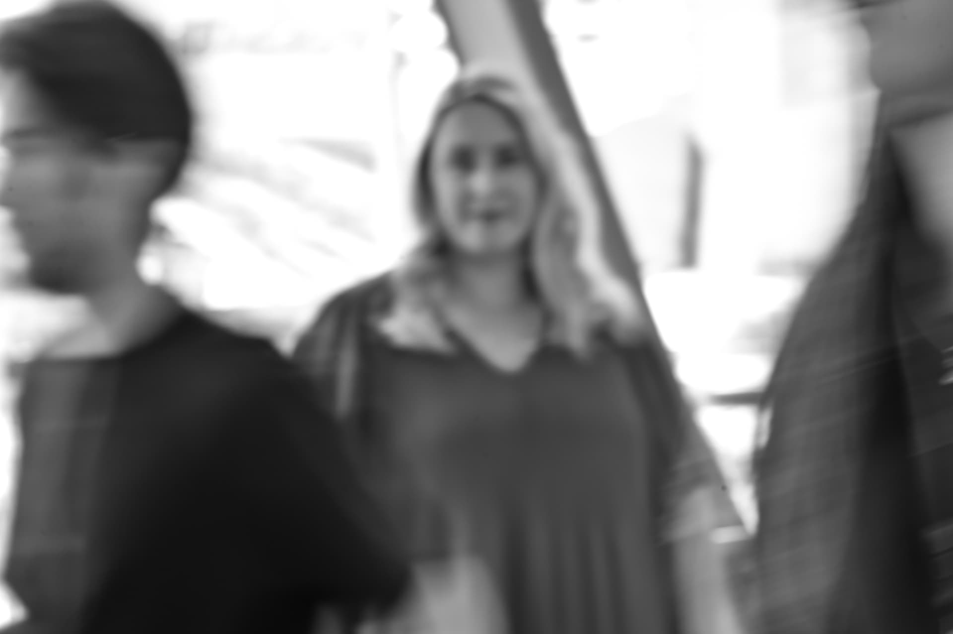 Emma Fishlock in sharp focus while the crowd around her blurs